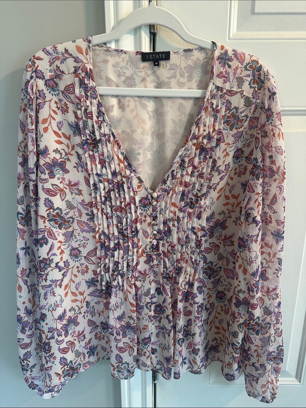 1. State Ivory Floral Pintuck V-Neck Blouse with Purple & Rust Accents